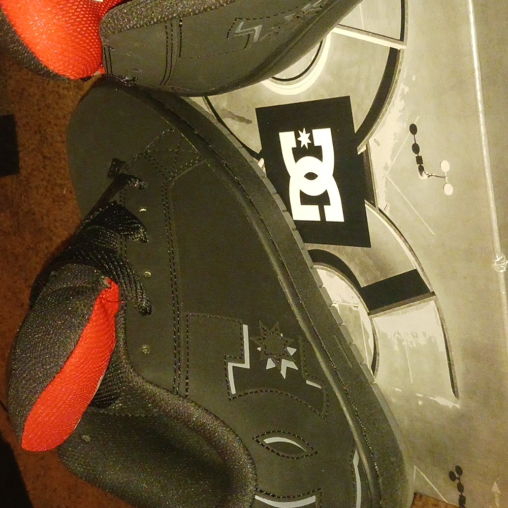 D.C 10.5 red/black court graffik..  NEVER WORN